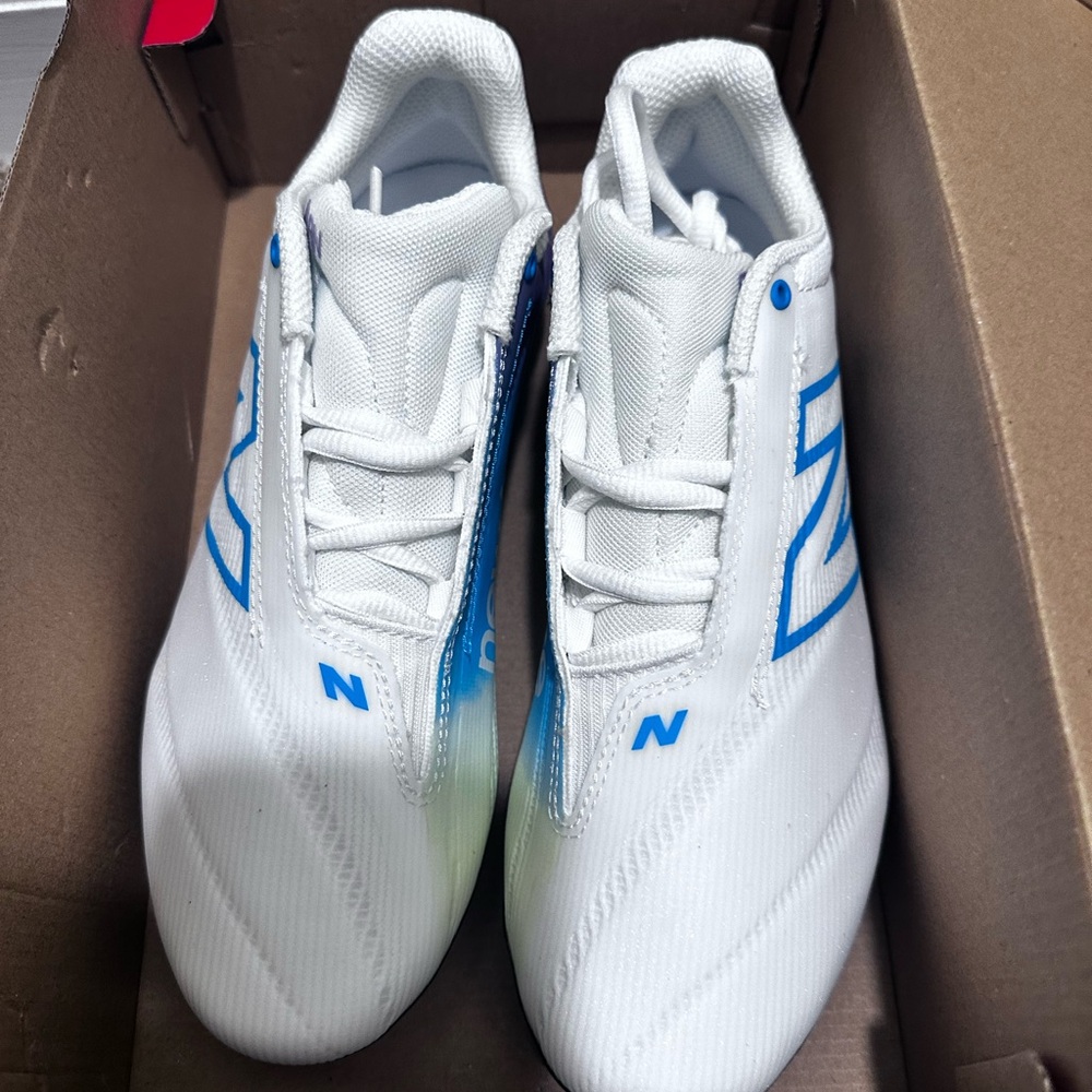 New Balance White and Black Lacrosse Shoes